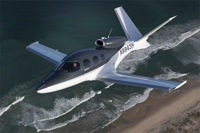 Cirrus SF50 Vision Jet over ocean
