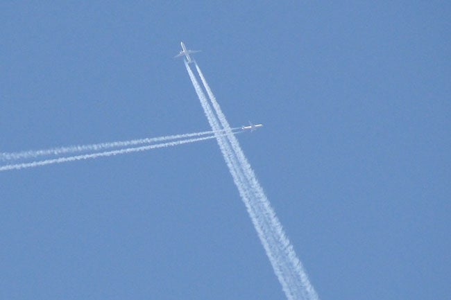 Jets crossing at RVSM altitude