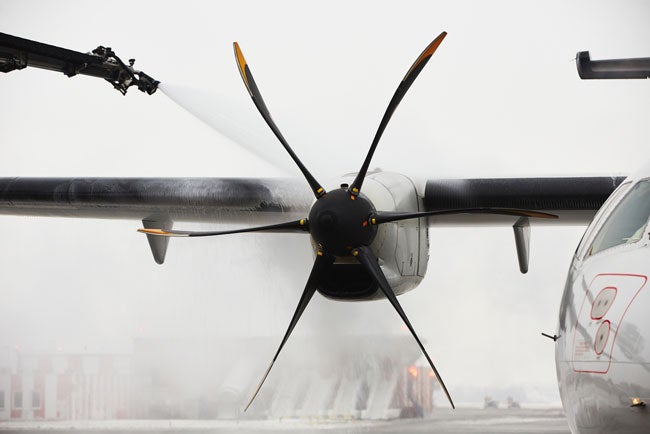 Aircraft de-icing fluid in use