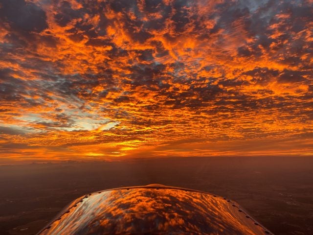 "Fiery Sunrise Over Texas," by Jon Hicks, the grand prize winner of the 2019 Your Flying World Contest