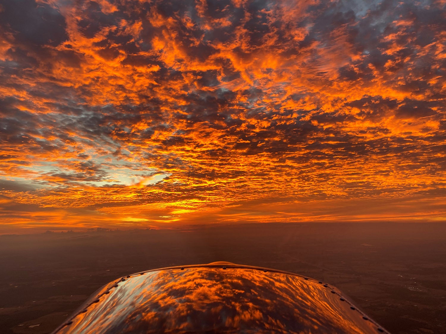 "Fiery Sunrise Over Texas," by Jon Hicks, the grand prize winner of the 2019 Your Flying World Contest