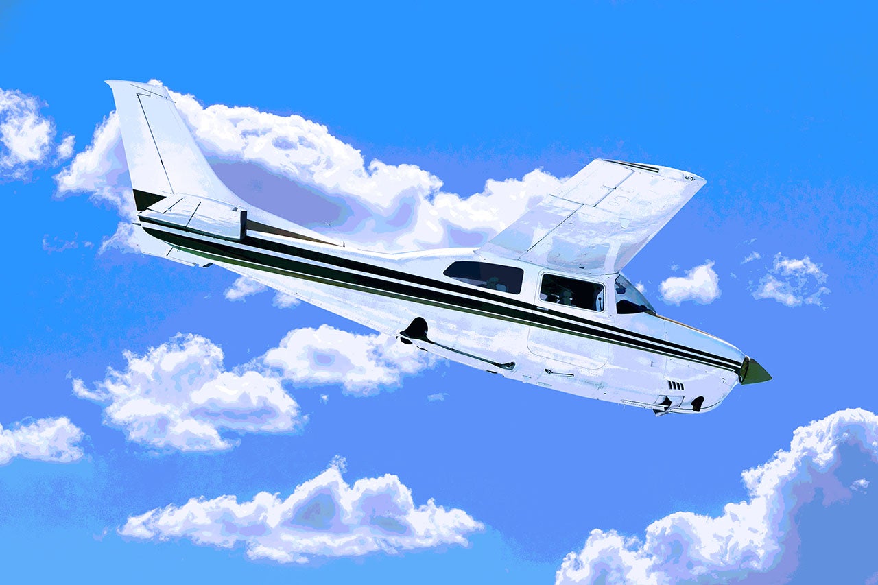 A Cessna 210 Descending