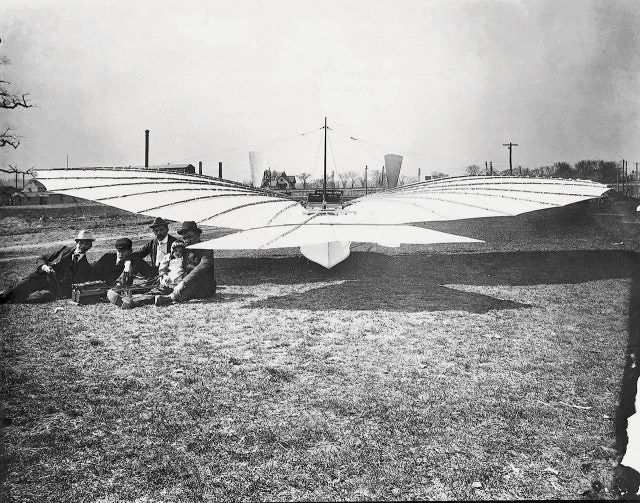 Gustave Whitehead and friends posing behind his plane known only as Number 21.