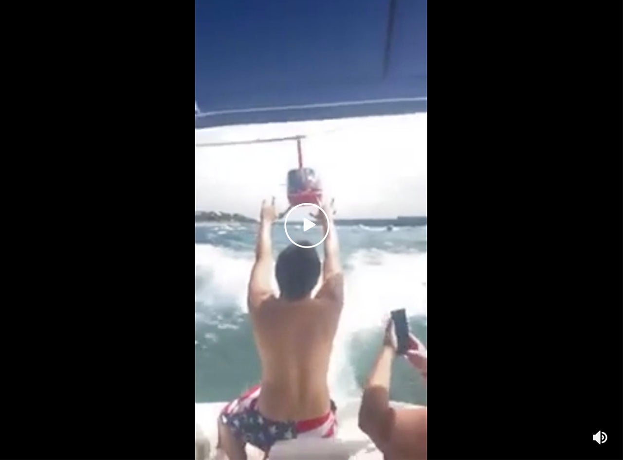Helicopter Buzzes Boaters At Trump Parade