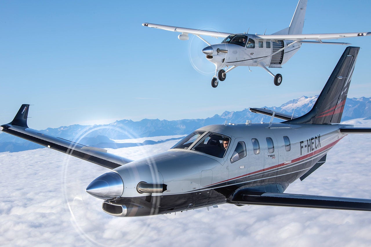 The Daher TBM 940 and Kodiak in formation, showing off the differences and similarities between the two single-engine turboprop beauties. Daher expects to make further refinements to the Kodiak over time.
