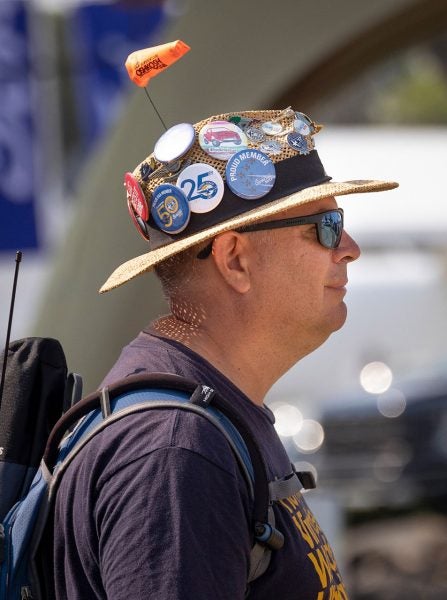 A proud Oshkosh regular takes in the daily airshow. Photo by Jim Koepnick