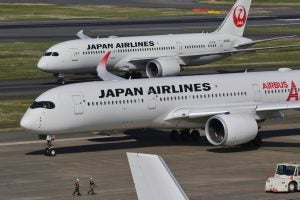 A Boeing 787 and an Airbus A-350 in Japan Airlines livery.