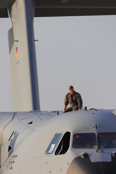 Crew member sits on Airbus A400 