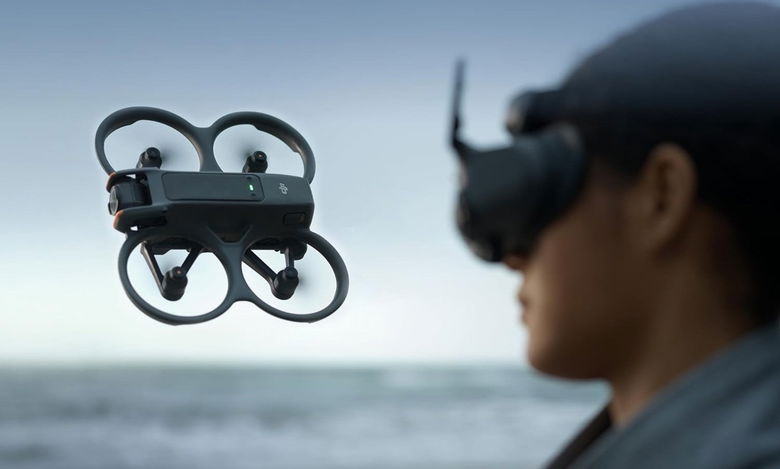 Drone in flight with pilot watching
