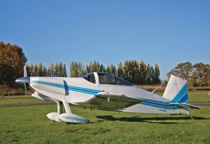 A Thorp T-18 on the grass illustrating the need for aircraft noise abatement